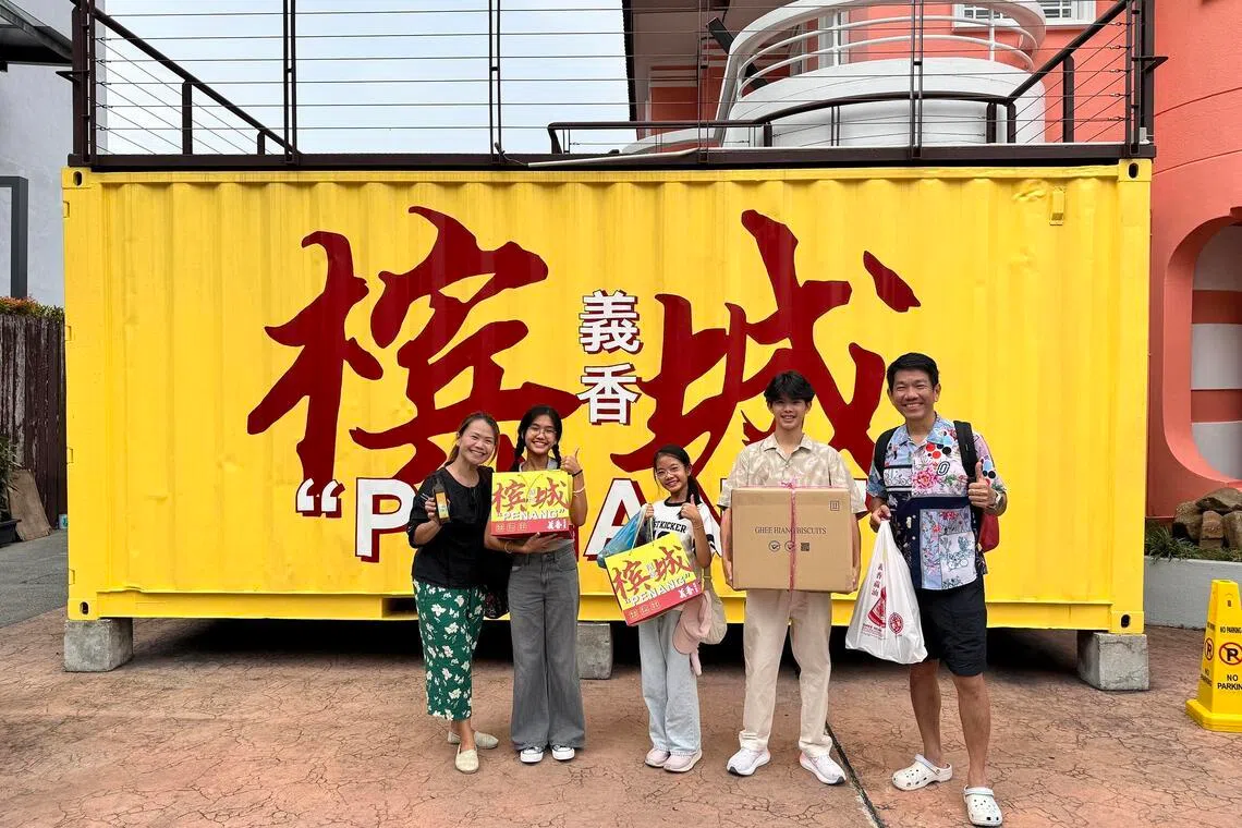 swmarch - (From left) Mother Marilyn Tay, Megan, Phoebe, Kayden and father George Kong in Penang.


PHOTO: COURTESY OF MARILYN TAY