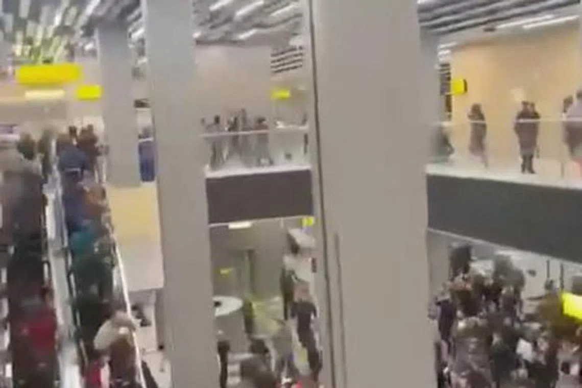 Pro-Palestinian protesters storm an airport building, in Makhachkala, Russia, October 29, 2023, in this screengrab taken from a video obtained by Reuters. Video Obtained by Reuters/via REUTERS  THIS IMAGE HAS BEEN SUPPLIED BY A THIRD PARTY. MANDATORY CREDIT. NO RESALES. NO ARCHIVES.