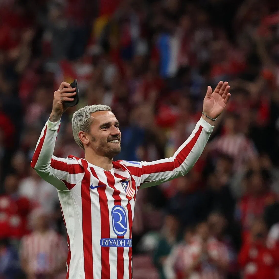 Soccer Football - UEFA Champions League - Quarter Final - Second Leg - Atletico Madrid v FC Barcelona - Riyadh Air Metropolitano, Madrid, Spain - April 14, 2026 Atletico Madrid's Antoine Griezmann celebrates after the match REUTERS/Gonzalo Fuentes