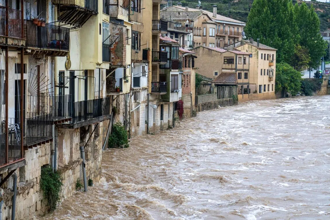The swollen Matarranya river flows through the town of Valderrobres, in the province of Teruel, Spain, on Oct 31.