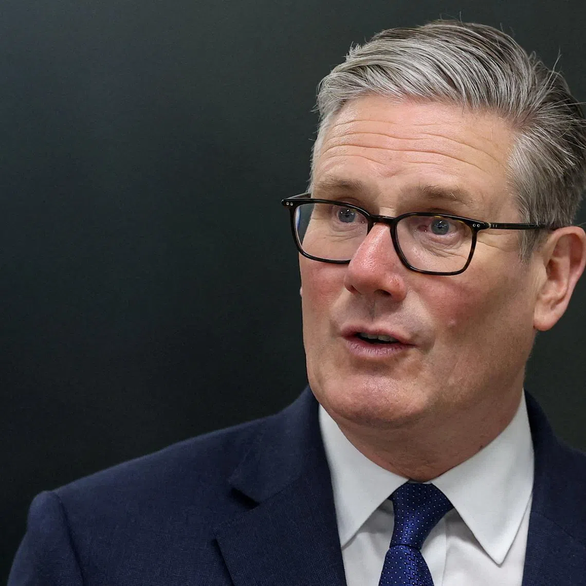 FILE PHOTO:                                                                Britain's Prime Minister Keir Starmer meets construction apprentices during a visit to London South Bank Technical College in London, Britain, May 12, 2026.  REUTERS/Toby Melville/Pool/File Photo