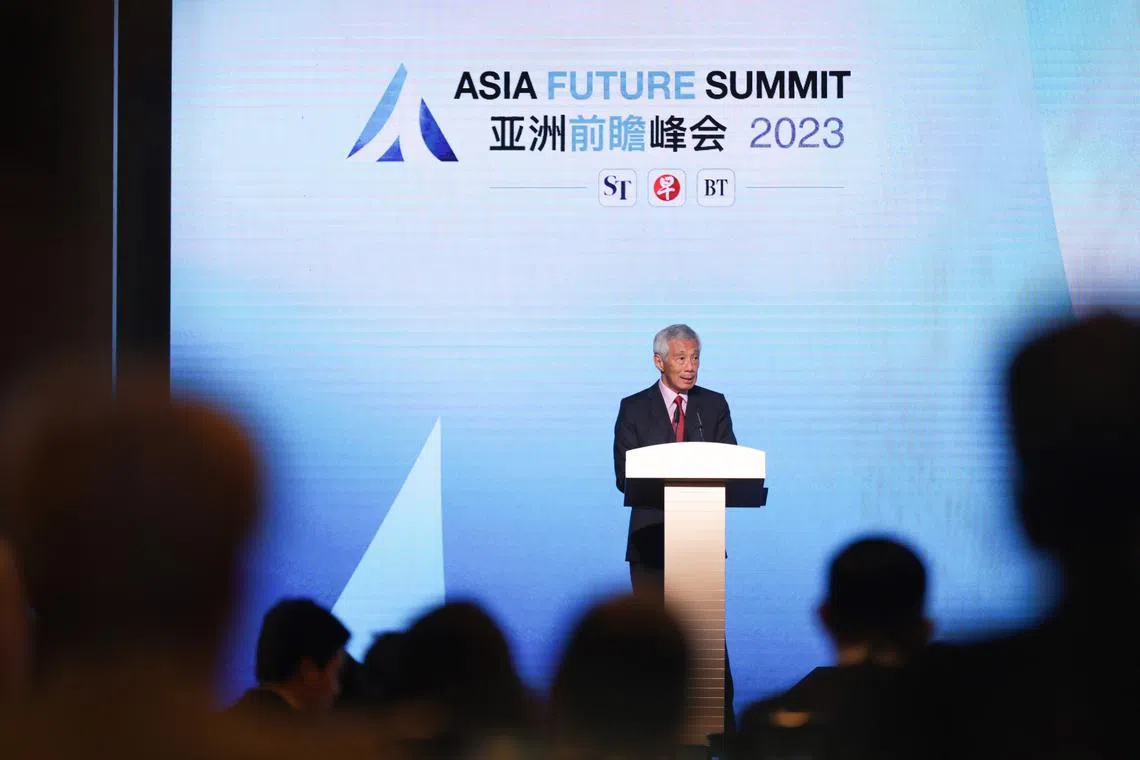 Prime Minister Lee Hsien Loong delivering a closing speech at the Asia Future Summit on Oct 5, 2023.