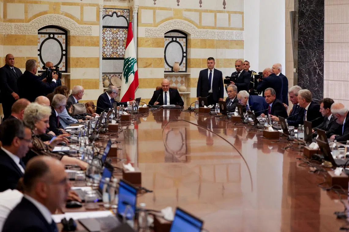 FILE PHOTO: Lebanese President Joseph Aoun, Lebanese Prime Minister Nawaf Salam and members of the Lebanese cabinet meet to discuss efforts to bring all weapons in the country under the control of the state, at the Presidential Palace in Baabda, Lebanon August 5, 2025. REUTERS/Emilie Madi/File Photo