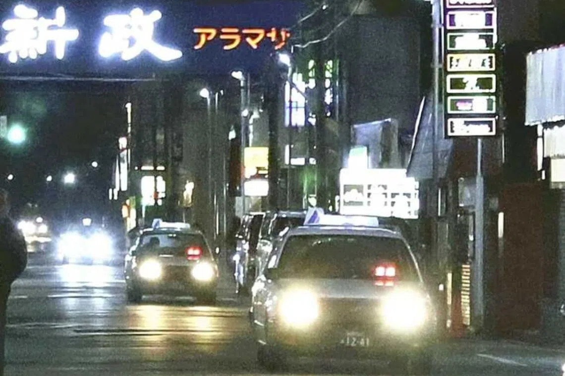 Only a few taxis were seen on a street in Kawabata entertainment district in Akita city on Nov 26.