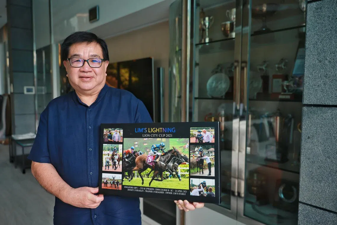 ST20230613_202395108223/jnhorse/Jean Iau/Jason Quah

Mr Lim Siah Mong, owner of Lim’s Stables, photographed with a photo of one of his horses, and some of his trophies, on June 13, 2023
//
Feature on the end of racing, speaking to horse racing owners on what the closure of Singapore Turf Club means to them