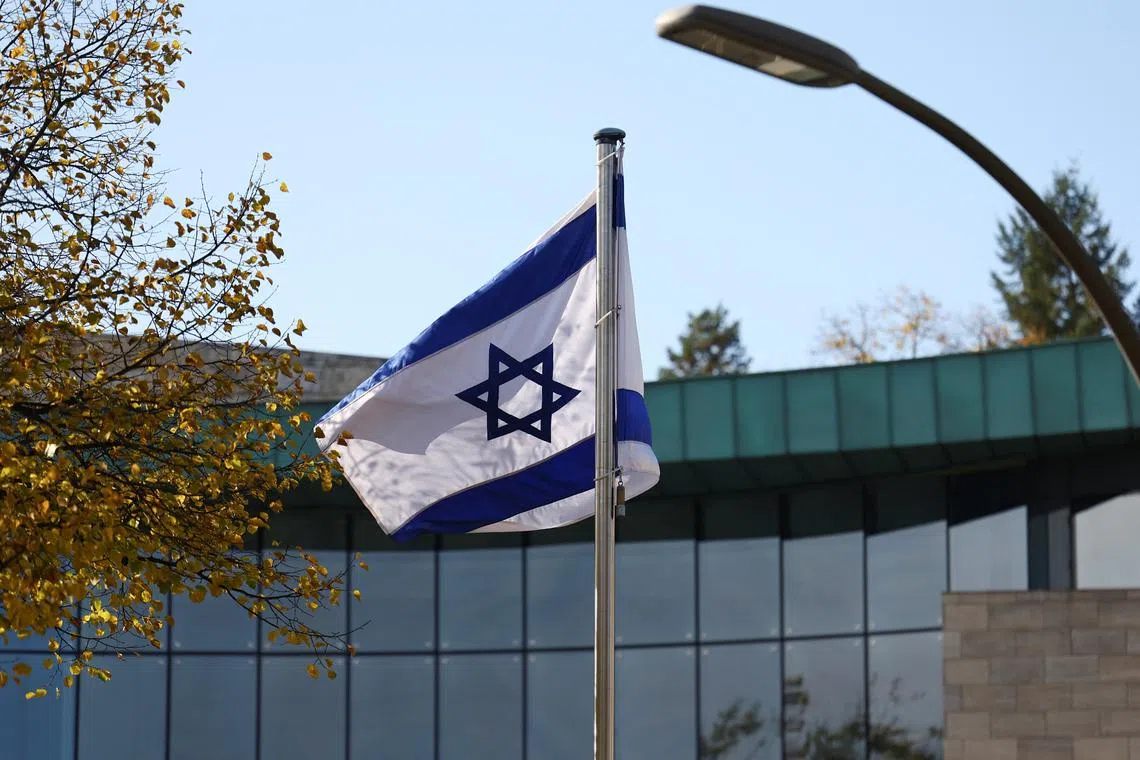 FILE PHOTO: An Israeli flag flutters at the embassy of Israel in Berlin, Germany, October 20, 2024. REUTERS/Lisi Niesner/ File Photo