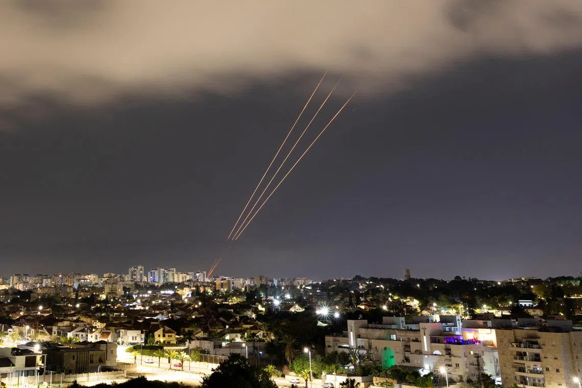 An anti-missile system operates after Iran launched drones and missiles towards Israel, as seen from Ashkelon, Israel April 14, 2024. REUTERS/Amir Cohen     TPX IMAGES OF THE DAY     