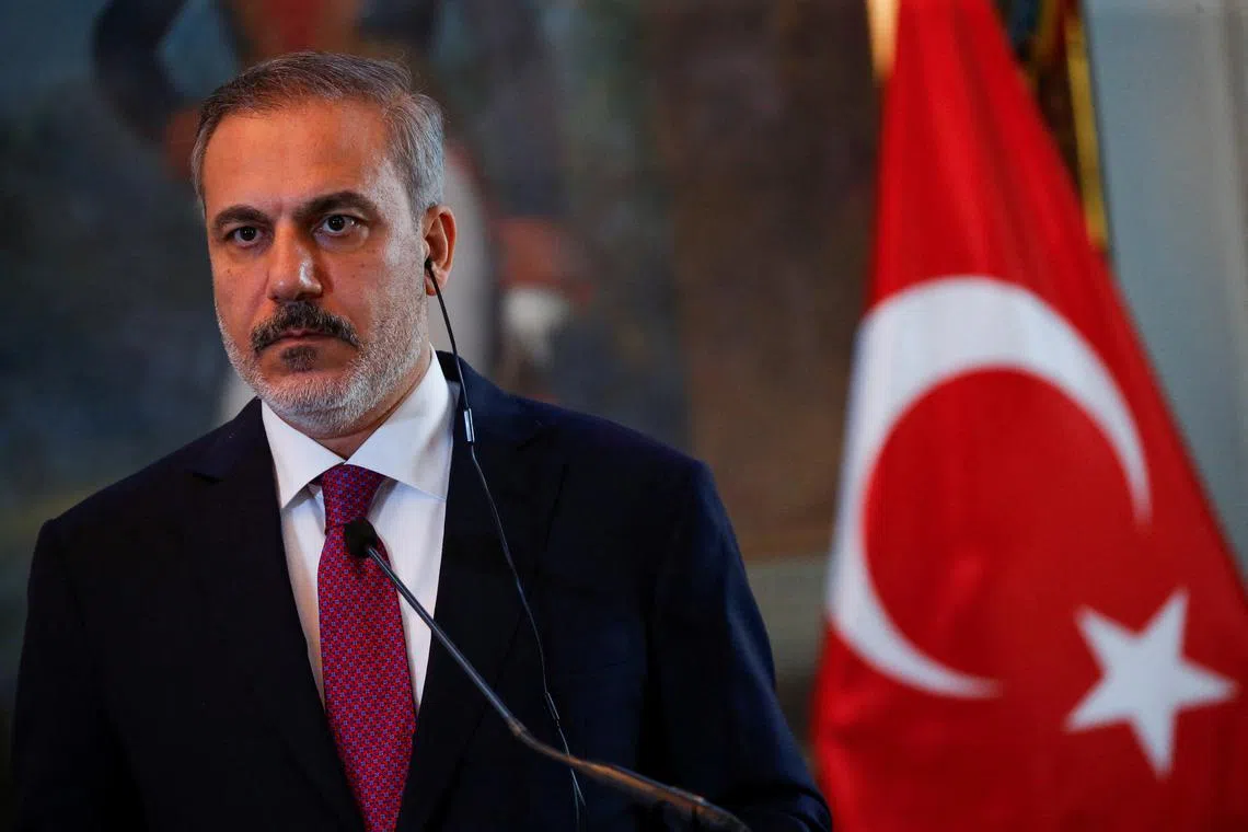 FILE PHOTO: Turkish Foreign Minister Hakan Fidan attends a press conference, with Venezuelan Foreign Minister Yvan Gil Pinto (not pictured), in Caracas, Venezuela February 24, 2024. REUTERS/Leonardo Fernandez Viloria/File Photo