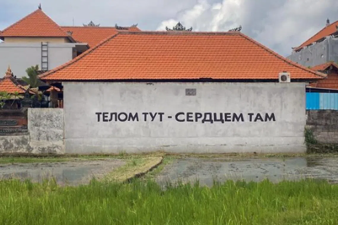 Mr Sergei Ovseikin stencilled in black Cyrillic lettering measuring 40cm high Russian words meaning “Body Here – Heart There”.