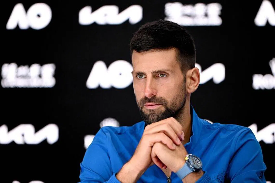 This handout picture released by the Tennis Australia on January 19, 2025 shows Serbia's Novak Djokovic speaks during a press conference at the Australian Open tennis tournament in Melbourne. (Photo by Vince CALIGIURI / TENNIS AUSTRALIA / AFP) / EDITORS NOTE ----RESTRICTED TO EDITORIAL USE MANDATORY CREDIT "AFP PHOTO / TENNIS AUSTRALIA/ VINCE CALIGIURI ” NO MARKETING NO ADVERTISING CAMPAIGNS - DISTRIBUTED AS A SERVICE TO CLIENTS