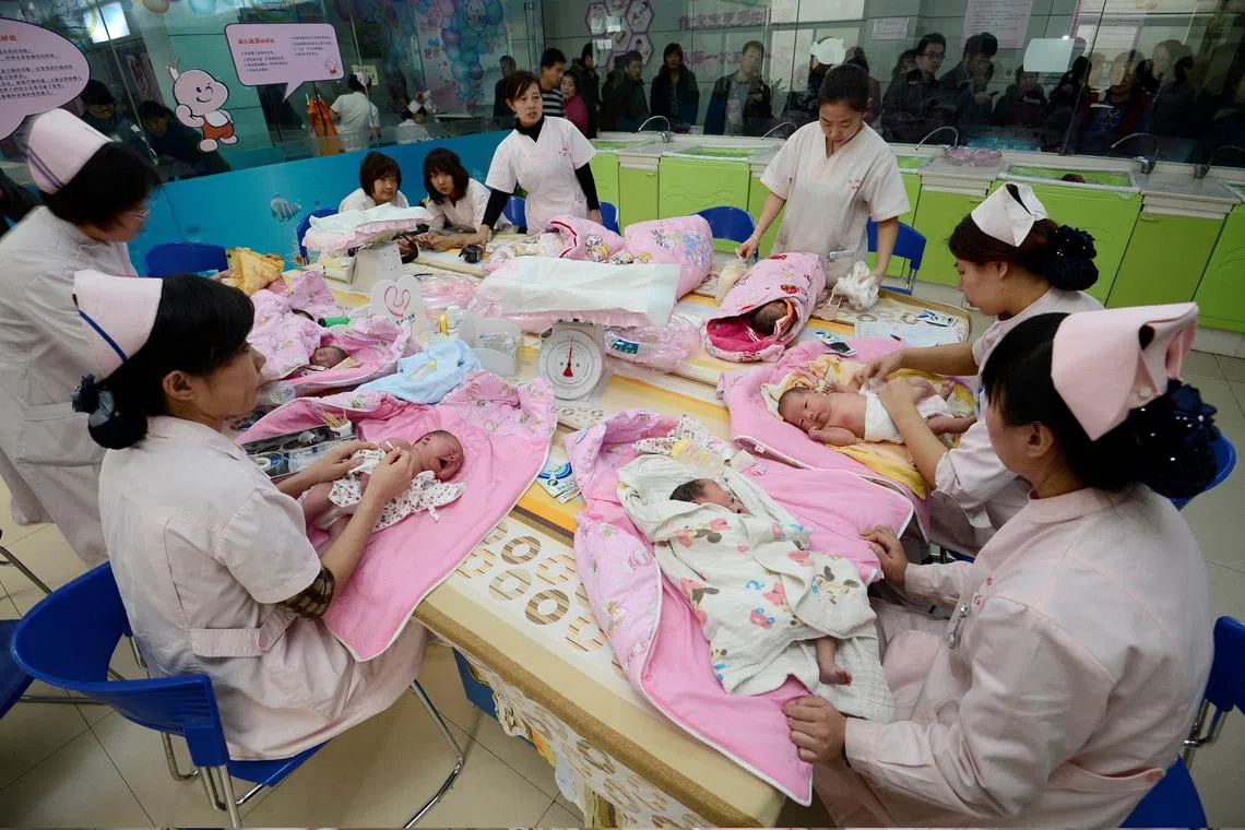 FILE PHOTO: Infants undergo a daily medical examination at a maternal and child health care hospital in Taiyuan, Shanxi province, December 3, 2012. REUTERS/Stringer/File Photo