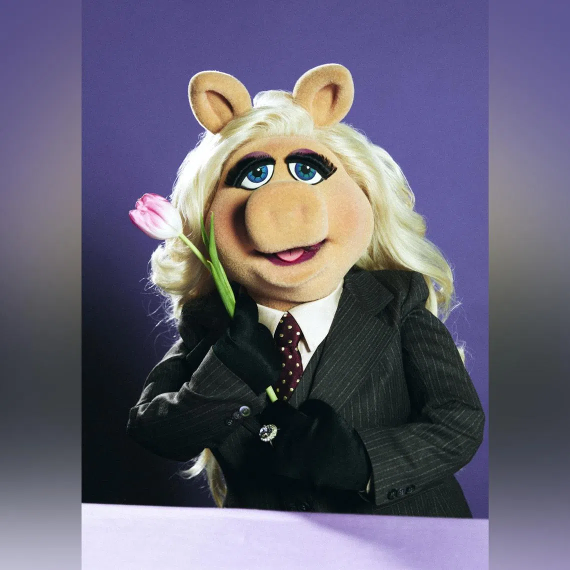 Miss Piggy began as a minor Muppet, but a sassy attitude and a karate chop carried her to the pinnacle of pop culture.