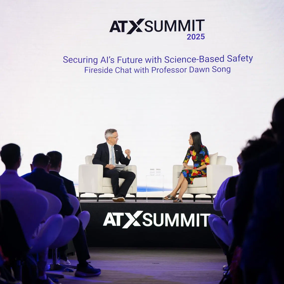 Professor Dawn Song (right) from the University of California, Berkeley at a fireside chat with Professor Simon Chesterman, senior director of AI governance at AI Singapore, at the Asia Tech x Singapore conference on May 28.