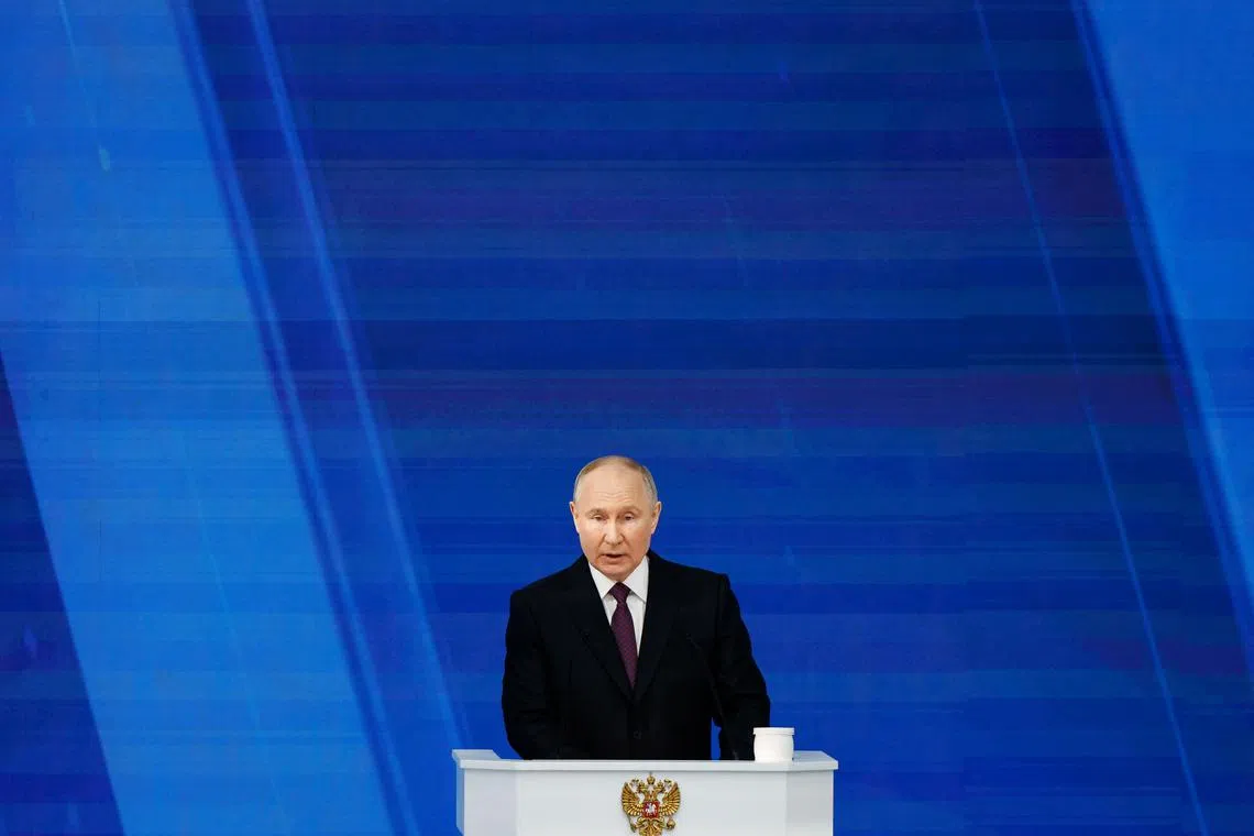 Russian President Vladimir Putin delivers his annual address to the Federal Assembly, in Moscow, Russia, February 29, 2024. REUTERS/Evgenia Novozhenina