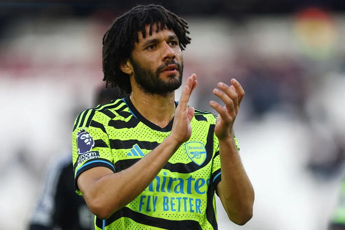 FILE PHOTO: Soccer Football - Premier League - West Ham United v Arsenal - London Stadium, London, Britain - February 11, 2024 Arsenal's Mohamed Elneny celebrates after the match REUTERS/Hannah Mckay/File Photo