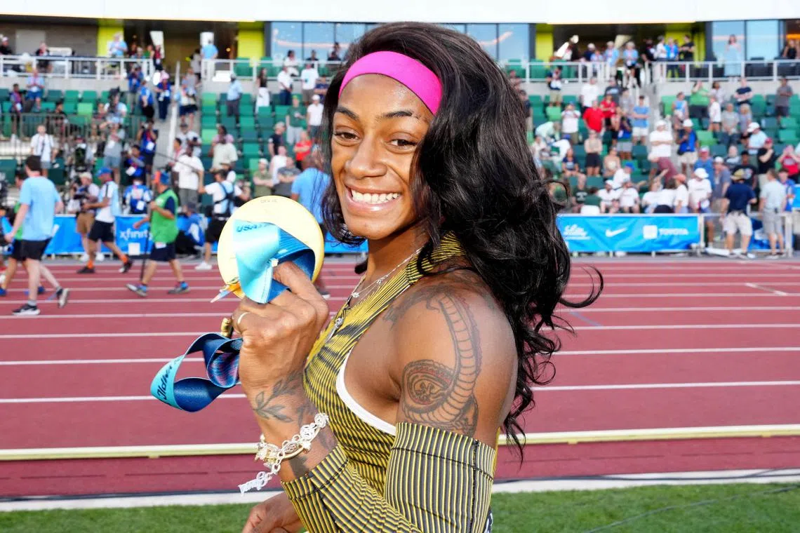 Jun 22, 2024; Eugene, OR, USA; Sha'Carri Richardson poses with gold medal after winning the women's 100m in 10.70 during the US Olympic Team Trials at Hayward Field. Mandatory Credit: Kirby Lee-USA TODAY Sports