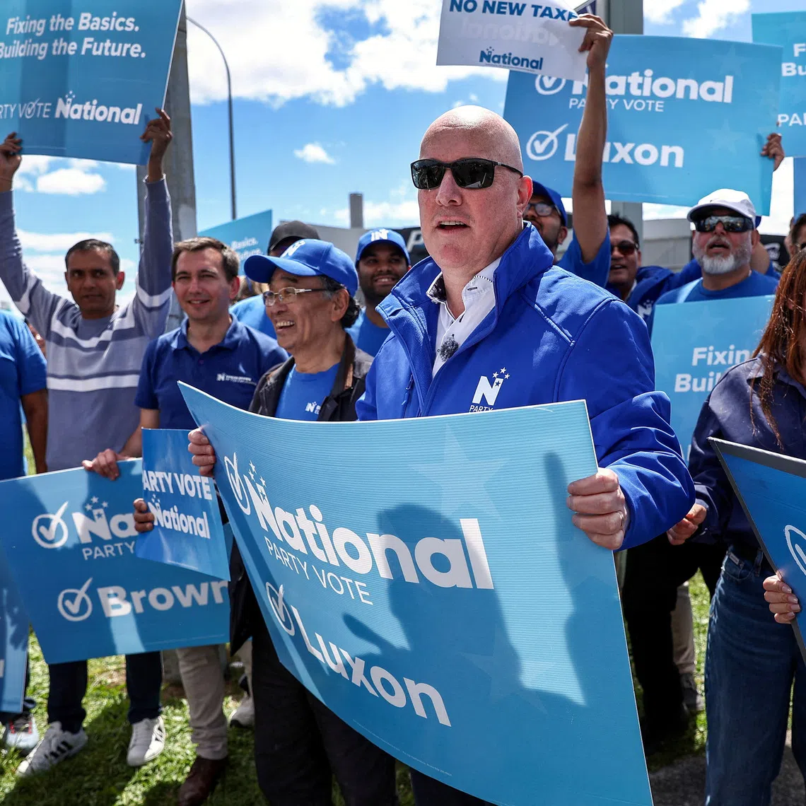 New Zealand’s Prime Minister and National Party leader Christopher Luxon campaigns in his Botany electorate in Auckland, on Oct 26.