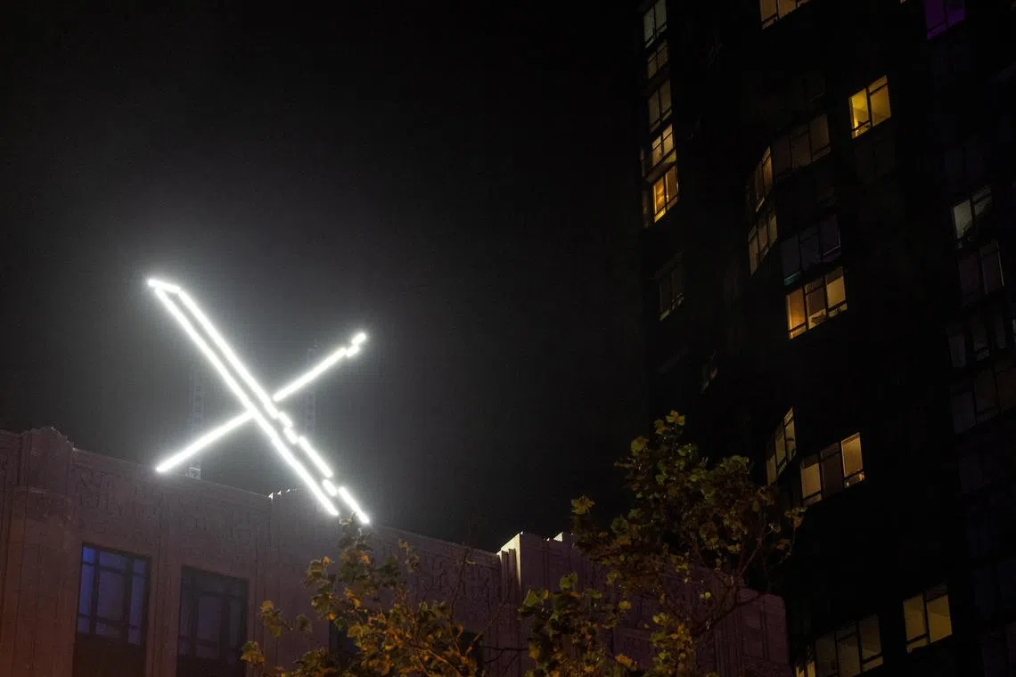 FILE PHOTO: 'X' logo is seen on the top of the headquarters of the messaging platform X, formerly known as Twitter, in downtown San Francisco, California, U.S., July 30, 2023. REUTERS/Carlos Barria/File Photo