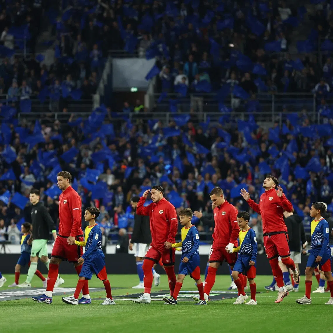 FILE PHOTO: Soccer Football - UEFA Conference League - Semi Final - Second Leg - RC Strasbourg v Rayo Vallecano - Stade de la Meinau, Strasbourg, France - May 7, 2026  Rayo Vallecano players walk onto the pitch before the match REUTERS/Christian Hartmann/ File Photo