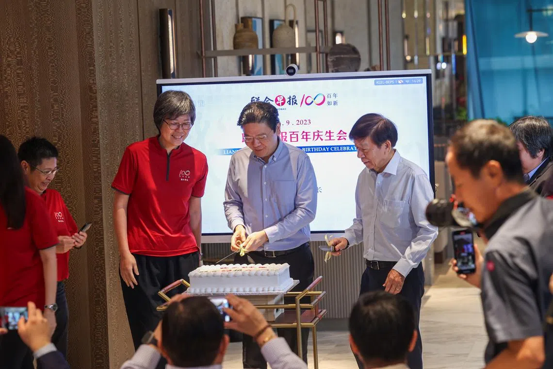 Deputy Prime Minister Lawrence Wong (centre) launched the daily’s commemorative projects at the Afro-Asia Building, on Sept 6.