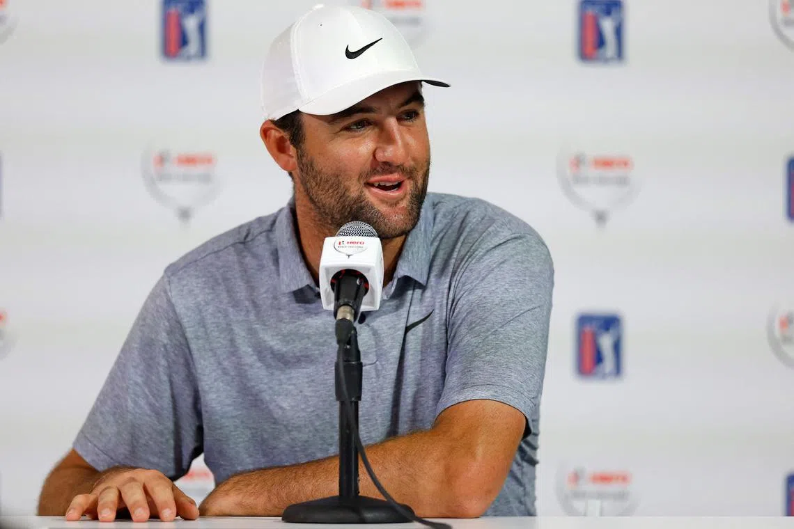 Scottie Scheffler of the United States speaks to the media during a practice round prior to the Hero World Challenge at Albany Golf Course.