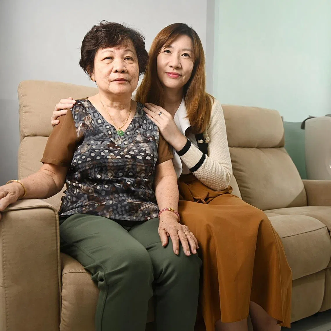 Ms Seline Cai pictured with her mother, Madam Chui Ah Loy, at their Woodlands HDB flat.