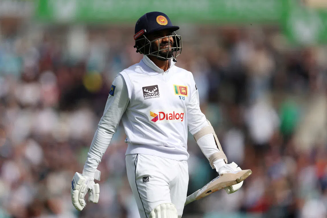 FILE PHOTO: Cricket - Third Test - England v Sri Lanka - The Oval, London, Britain - September 8, 2024 Sri Lanka's Dhananjaya de Silva walks back to the pavilion after losing his wicket, caught out by England's Shoaib Bashir off the bowling of Josh Hull Action Images via Reuters/Paul Childs/File Photo