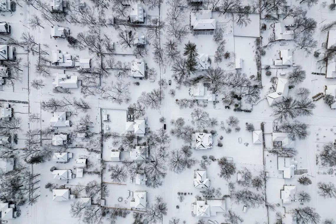 An aerial photo showing several inches of fresh snow covering a residential neighborhood on Jan 25, 2026 in Columbia, Missouri. A massive winter storm dumped snow and freezing rain from New Mexico to North Carolina as it swept across the U.S.