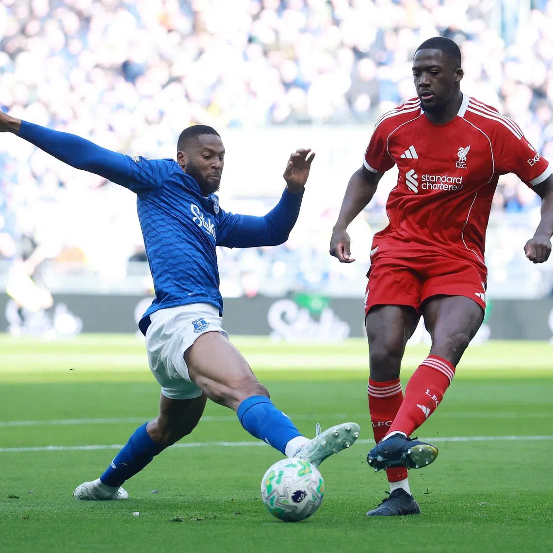 Soccer Football - Premier League - Everton v Liverpool - Hill Dickinson Stadium, Liverpool, Britain - April 19, 2026 Everton's Beto in action with Liverpool's Ibrahima Konate. REUTERS/Phil Noble