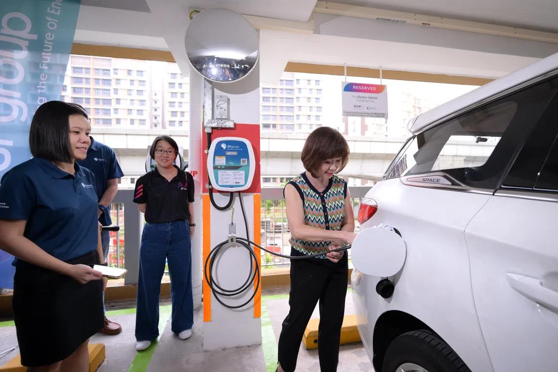 Senior Minister of State for Transport, Sustainability and the Environment and Adviser to Hong Kah North SMC, Dr Amy Khor launching the first electric vehicle chargers at Plantation Crescent in Tenggah Estate on Feb 25, 2025.