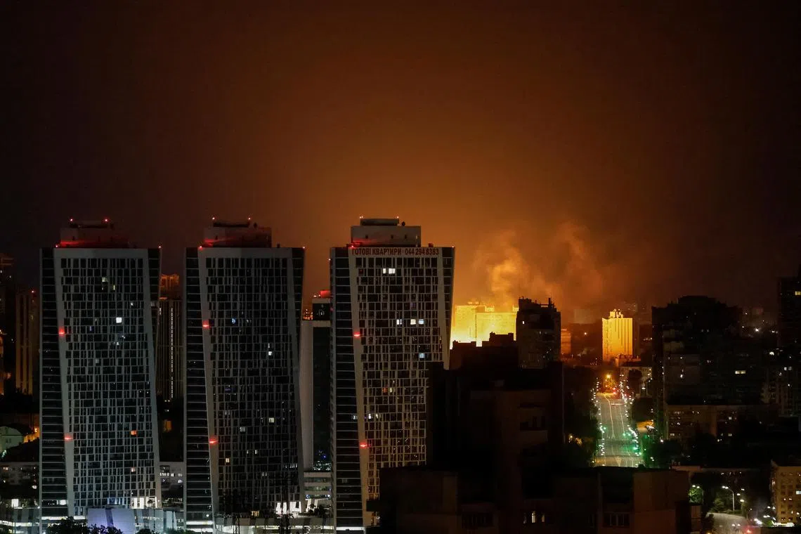 An exploding drone lighting up the sky over Ukraine's capital, Kyiv, on June 10, amid an attack by Russia which saw over 300 drones  and seven missiles target Ukraine.
