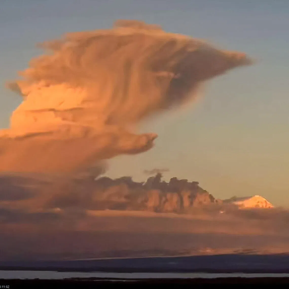 An ash plume from the Shiveluch volcano as seen from the settlement of Klyuchi in the far eastern Kamchatka peninsula in Russia.  