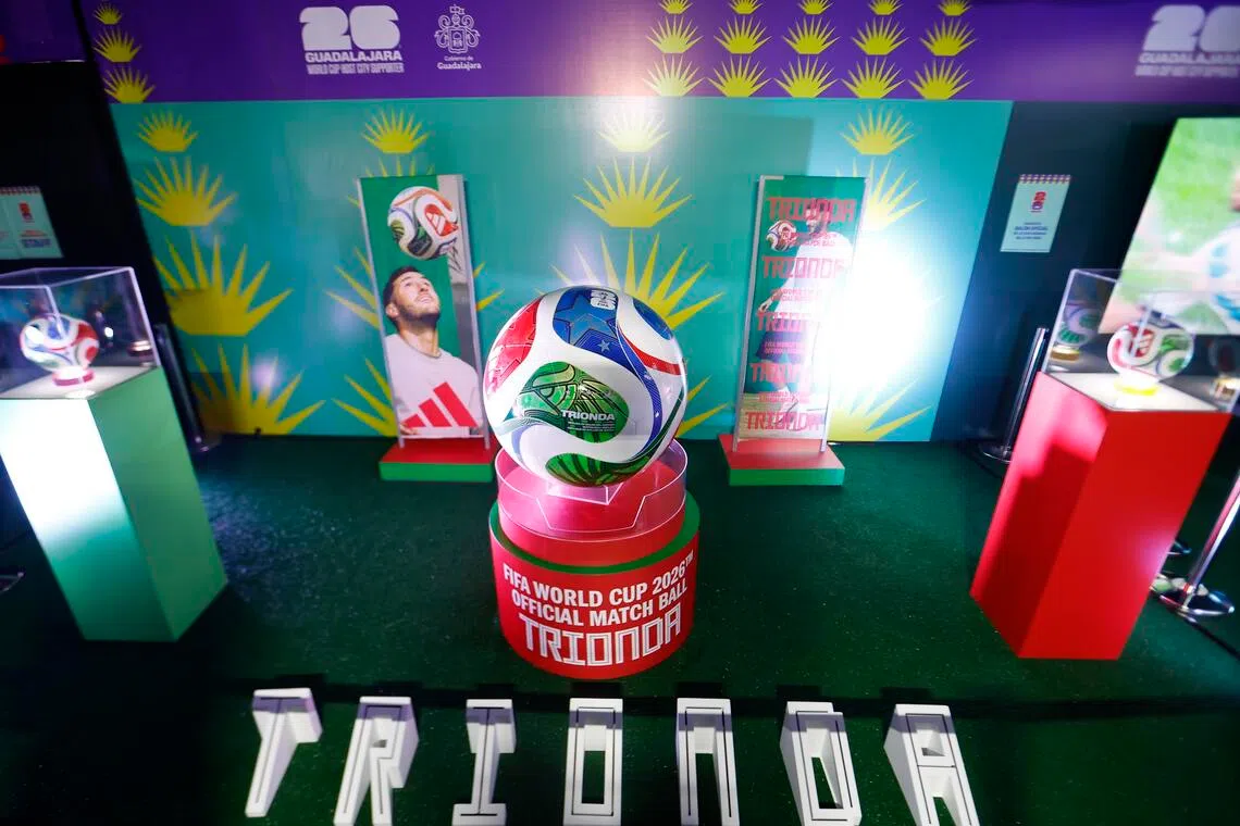 A display of 'Trionda', the official ball of the 2026 World Cup, is presented during the opening of the 'The Soul of the World Cup' pavilion in Guadalajara, Mexico.