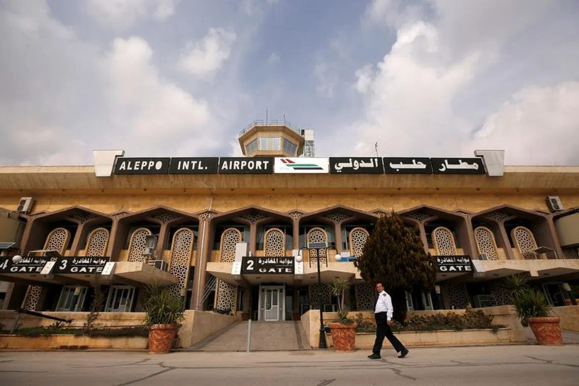 A man walks at Aleppo international airport after it was reopened for the first time in years, Syria February 19, 2020. REUTERS/Omar Sanadiki/file photo