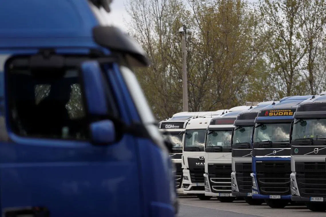 FILE PHOTO: Ukrainian trucks wait at the Hungarian-Ukrainian border, in Zahony, Hungary, April 19, 2023. REUTERS/Bernadett Szabo/File Photo