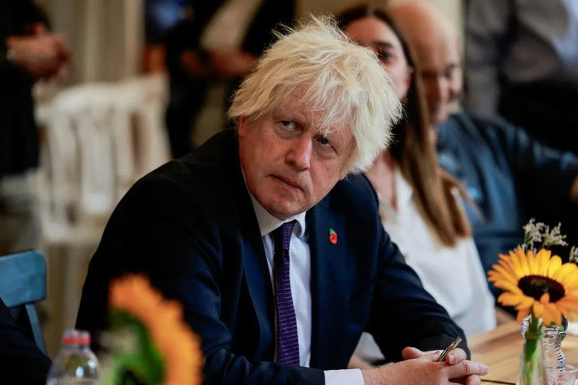 Former British Prime Minister Boris Johnson looks on as he meets with British-Israeli soldiers during a visit to Jerusalem, November 5, 2023. REUTERS/Ammar Awad/File Photo