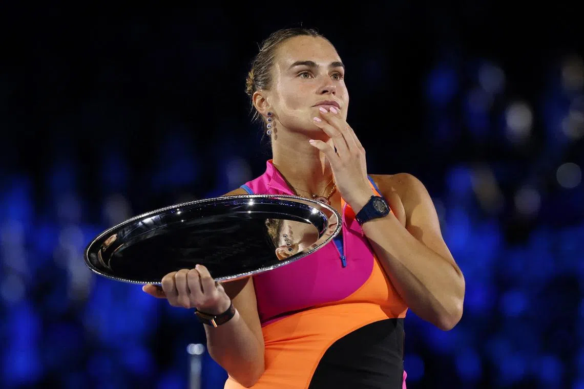 Tennis - Australian Open - Melbourne Park, Melbourne, Australia - January 31, 2026 Belarus' Aryna Sabalenka on the podium with the runners up trophy after the women's singles final against Kazakhstan's Elena Rybakina REUTERS/Hollie Adams
