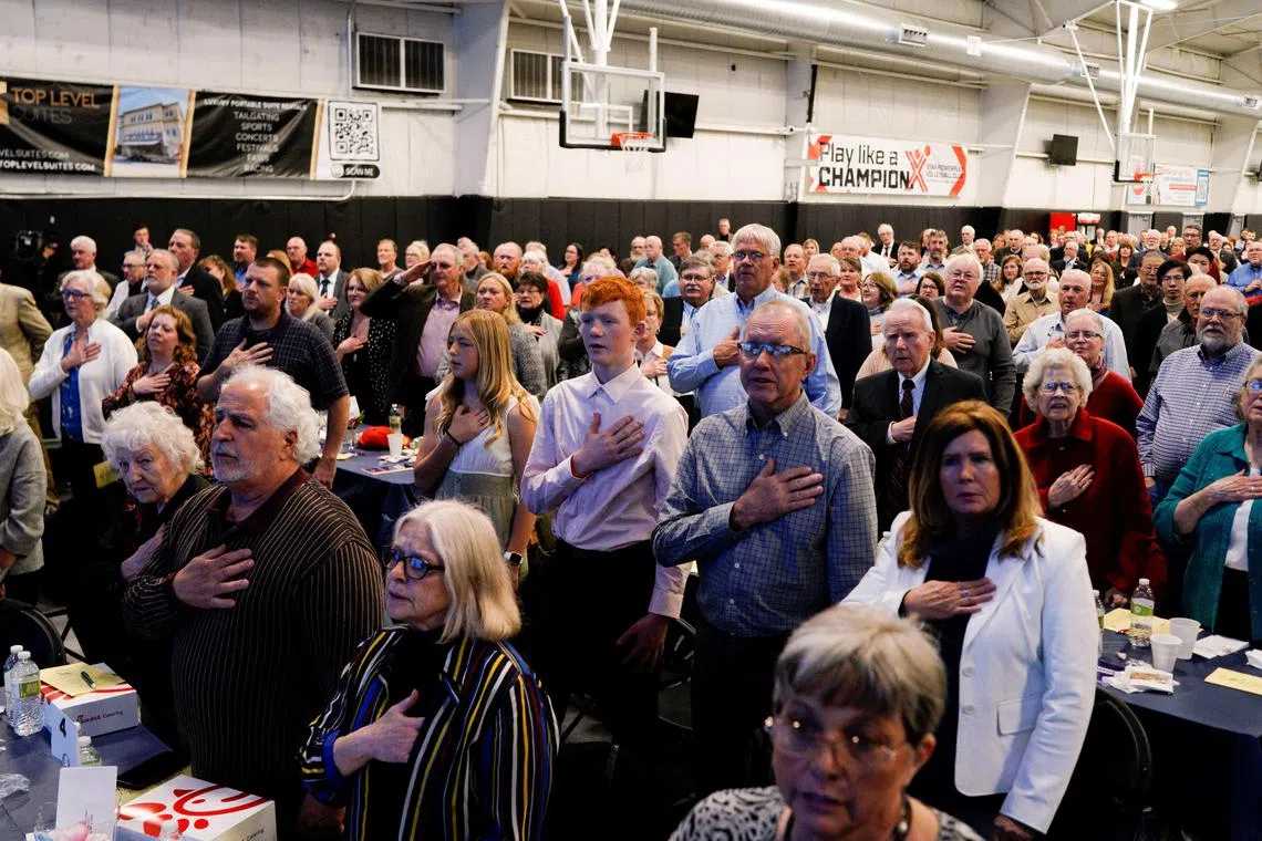 People attend the Iowa Faith & Freedom Coalition Spring Kick-off in West Des Moines, Iowa, April 22.
