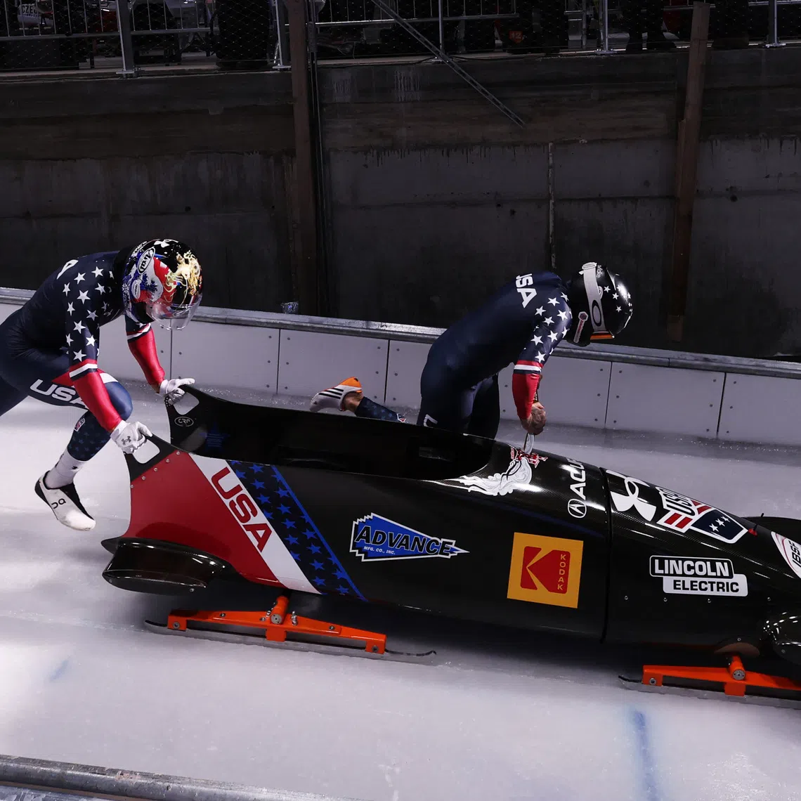Olympics - 2026 Milano-Cortina Winter Olympics - Test Event - IBSF World Cup - 2 Woman Bobsleigh - Cortina Sliding Centre, Cortina d'Ampezzo, Italy - November 23, 2025 Kaillie Humphries and Sylvia Hoffman of the U.S. in action during heat 1 REUTERS/Claudia Greco