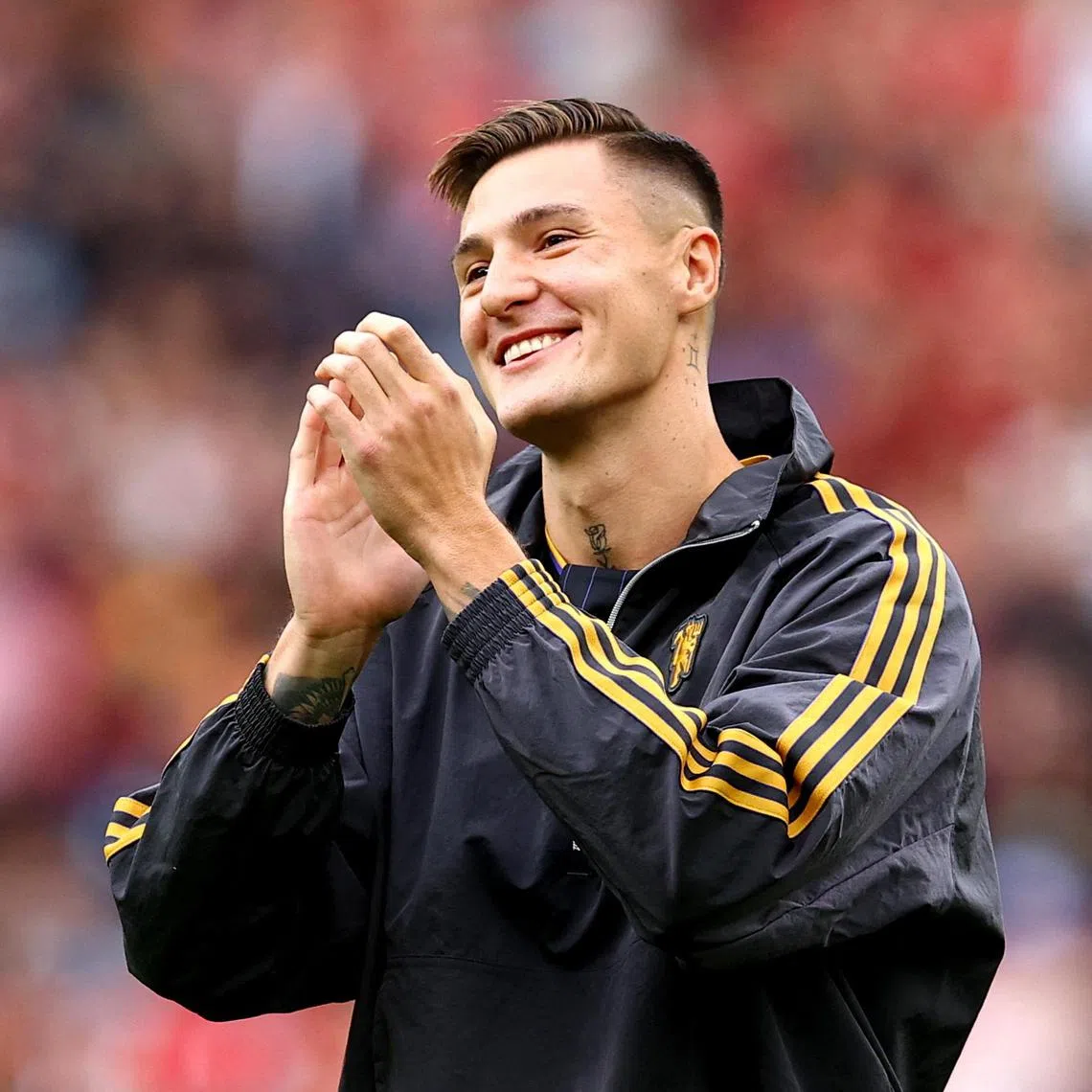 New Manchester United player Benjamin Sesko applauding fans before the friendly match against Fiorentina on Aug 9.