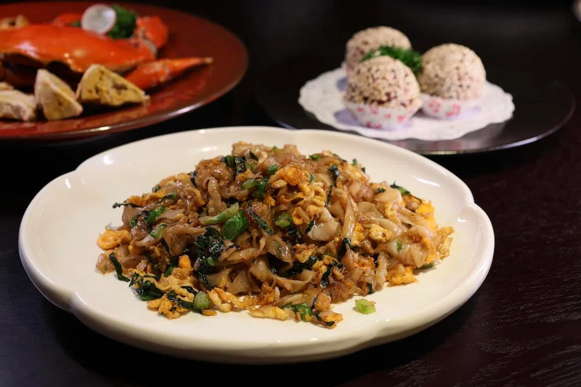hkpicks07 - Clockwise, from top left: Chilled Drunken Yellow Crab Roe, Deep Fried Sweet Potato Sesame Ball With Salted Egg Yolk and Wok-fried Preserved Radish Hor Fun at Xiao Fu Yuan.

ST PHOTO: HEDY KHOO
THE STRAITS TIMES
SPH EDITORIAL USE ONLY
upload to LIFE