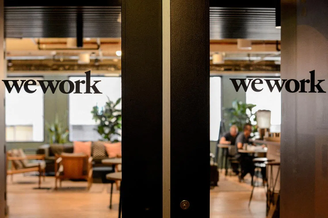 WeWork, which earlier this month warned about its ability to stay afloat, said its common shares will continue to trade on the NYSE.