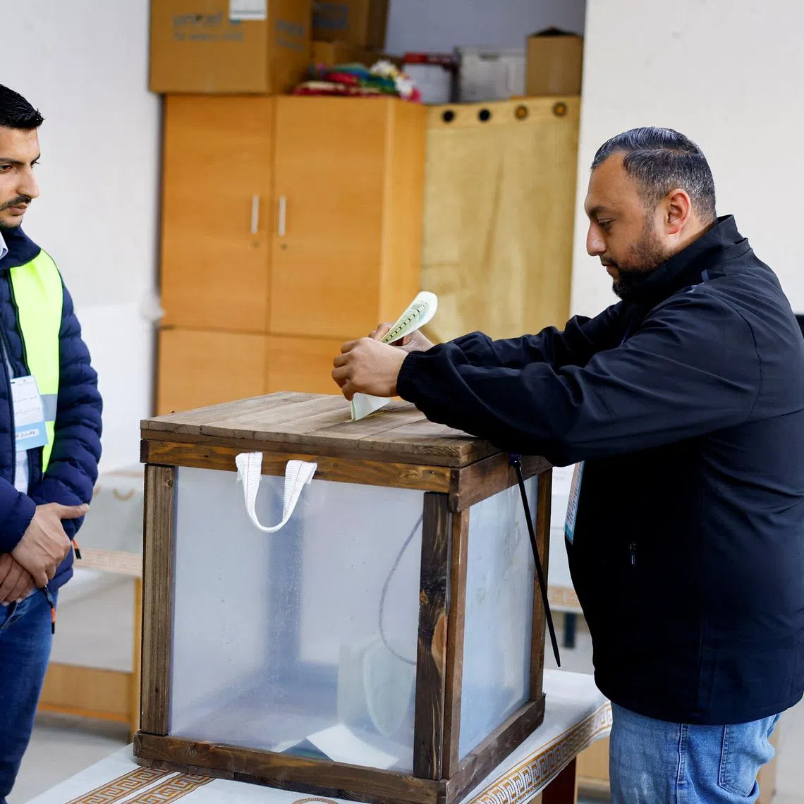 A Palestinian man votes during the municipal election at a polling station in Deir al-Balah, central Gaza Strip April 25, 2026. REUTERS/Mahmoud Issa