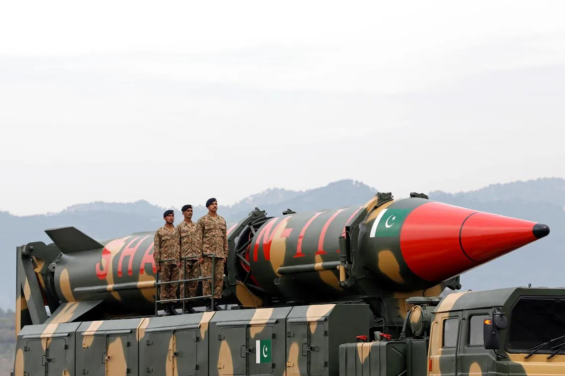 FILE PHOTO: Pakistani military personnel stand beside a Shaheen III surface-to-surface ballistic missile during Pakistan Day military parade in Islamabad, Pakistan March 23, 2019. REUTERS/Akhtar Soomro/File Photo