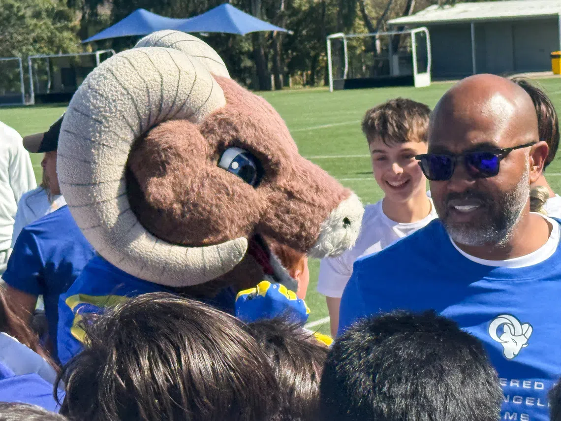 Former NFL player Torry Holt at a coaching clinic for flag football at Balwyn High School in Melbourne, Australia September 8, 2026. REUTERS/Ian Ransom