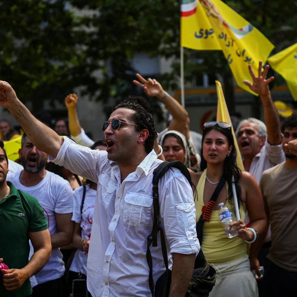A man attends a demonstration against political executions in Iran and in support of a democratic republic, a demonstration which was banned by Paris Police Prefecture, in Paris, France, June 20, 2026. REUTERS/Sarah Meyssonnier