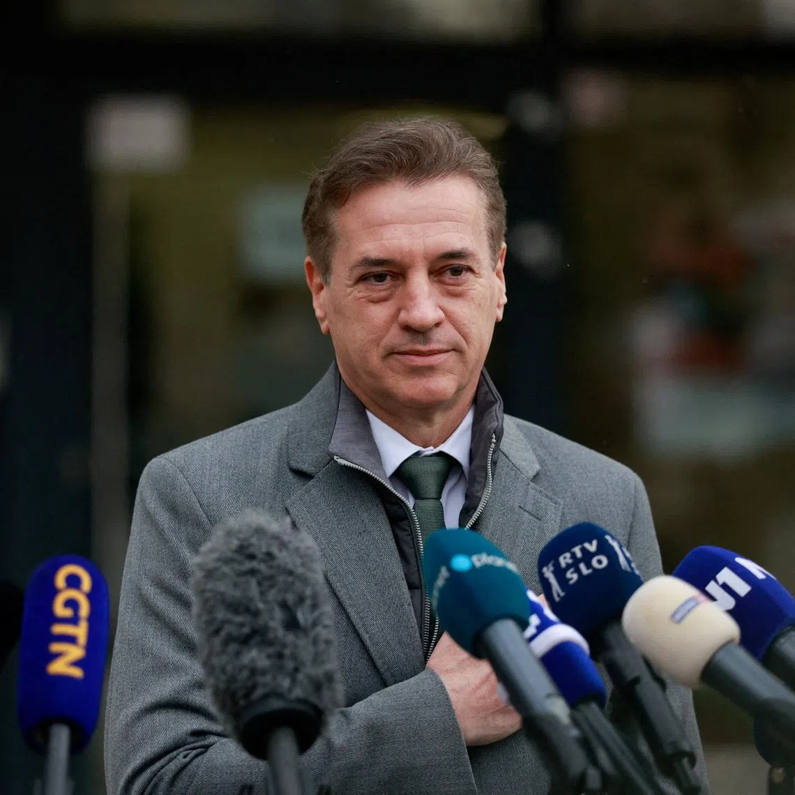 FILE PHOTO: Slovenia's Prime Minister Robert Golob speaks to the media after voting during the parliamentary election in Ljubljana, Slovenia, March 22, 2026. REUTERS/Borut Zivulovic/File Photo