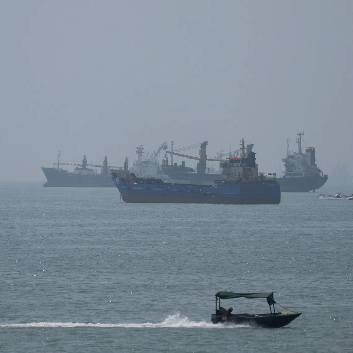 Vessels in the Strait of Hormuz are visible near the beach of Bandar Abbas, Iran, on Aug 28.