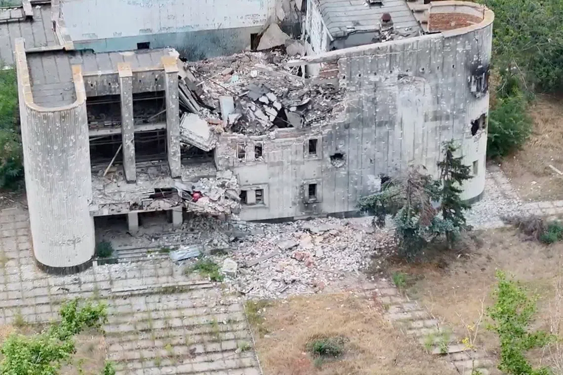 FILE PHOTO: A still image taken from an undated drone video released September 12, 2026, shows a destroyed building in Oleshky, Kherson Region, Russian-controlled Ukraine. 34th Separate Marine Brigade \"Borysfen\"/Handout via REUTERS/File Photo