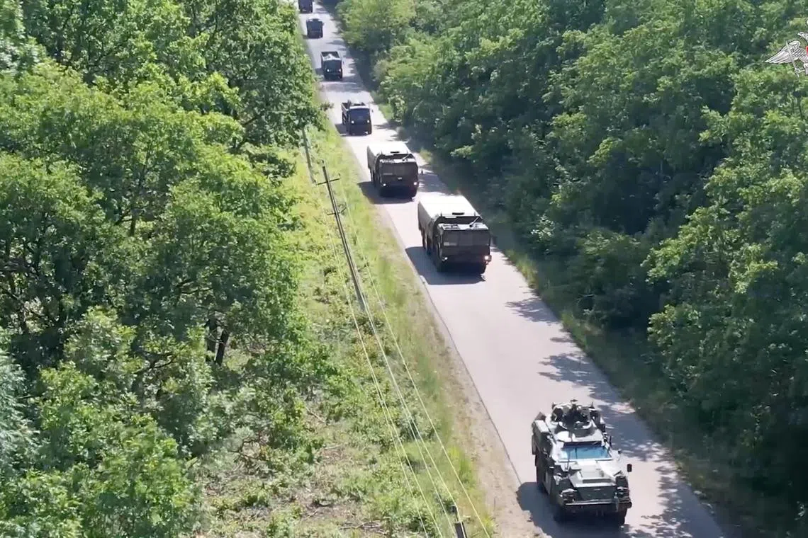 Russian military vehicles are seen during the first stage of drills, involving practical training in the preparation and use of non-strategic nuclear weapons, at an unknown location in Russia's Southern Military District, in this still image taken from video released May 21, 2024. Russian Defence Ministry/Handout via REUTERS